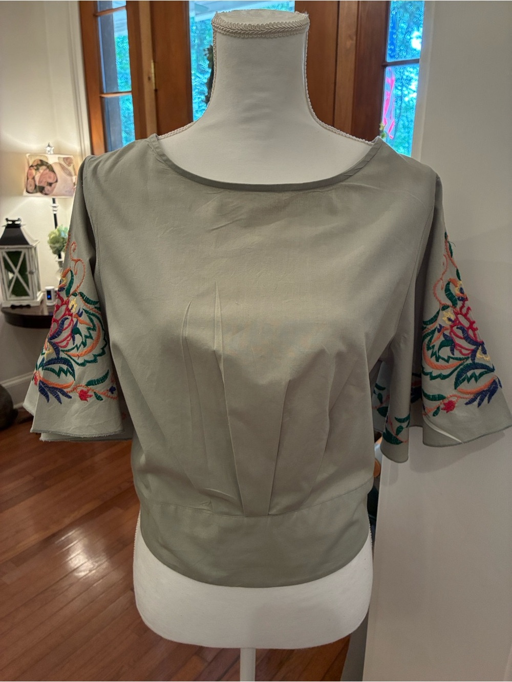 Isa & Ella Embroidered Flutter Sleeve Blouse in Sage with Open Tie Back Cotton